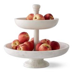 two tiered tray with apples on it