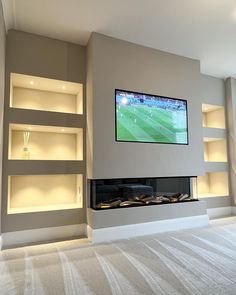 a flat screen tv mounted to the side of a wall above a fireplace in a living room