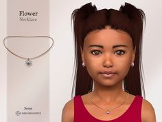 a girl wearing a necklace and earrings next to a box