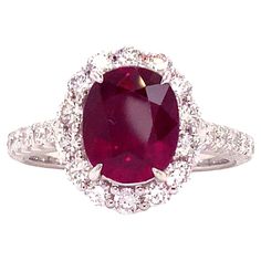 an oval shaped ruby and diamond ring