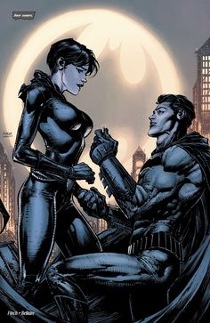 batman and catwoman in front of the moon