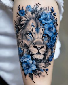 a lion with blue flowers on his thigh