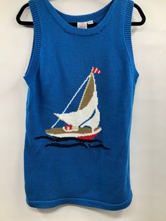 "Vintage 1980's does 1940's knit tunic with sailing scene. Cotton knit. Longer style. Bright blue. Has a very Great Gatsby feel to it. Good vintage condition, one tiny food stain on the sail that will most likely come out with a cold gentle wash and hang dry. Otherwise good vintage condition, no holes, pilling or smells. J.G. Hook brand, made in Hong Kong. Tagged M Measured flat: 18\" pit to pit, 30\" overall length" Vintage Knitted Cotton Tops, Blue Cotton Tops For Boating, Nautical Cotton Sweater With Crew Neck, Nautical Cotton Crew Neck Sweater, Sweater Tunic, Tiny Food, J G, Silky Blouse, Cute Jackets