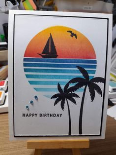 a happy birthday card with a sailboat and palm trees