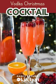 vodka christmas cocktail with oranges and cranberries