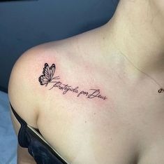 a woman with a butterfly tattoo on her shoulder saying, i love you dearly