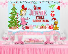 a table with pink candy and decorations on it, including a sign that says how jennyie stole christmas