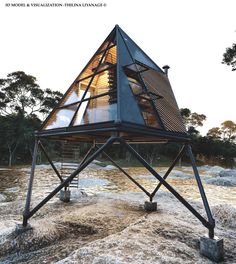 an unusual house built on stilts in the water