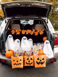 The back of a hatchback car open and decorated with fall leaves and small diy ghosts. Trunk Or Treat Ghost Theme, Halloween Trunk Or Treat Themes, Creative Decoration Ideas, Monster Decorations, Diy Monsters, Ghost Diy, Modern Halloween