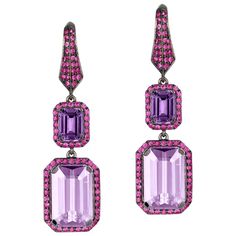 Emerald Cut Amethyst, Lavender and Pink Sapphire Earrings in 18K Yellow Gold and Light Black Rhodium, from 'Rain Forest' Collection Stone Size: 9 x 7 mm & 10 x 15 mm Gemstone Approx Wt Amethyst - 3.92 Carats. Lavender Amethyst - 14.12 Carats Pink Sapphire - 2.39 Carats Earrings Curation, Flowers Rings, Sapphire Drop Earrings, Modern Hoop Earrings, Marquise Earrings, Pink Sapphire Earrings, Sapphire And Diamond Earrings, Lavender Amethyst, Pink Sapphire Ring