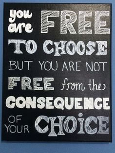 a black and white sign that says, you are free to choose but you are not free from the consequince of your choice