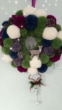 a christmas wreath hanging on the wall