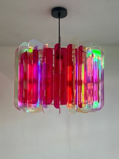 a multicolored light fixture hanging from the ceiling