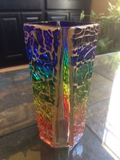 there is a glass that has been made to look like something out of stained glass