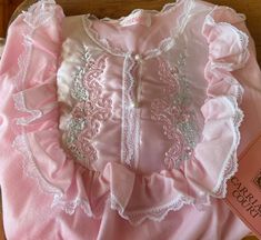 "New old Stock Vintage Fleecy Nightgown by Sears Carriage Court. Gift for Her. Made in USA. 1970s to 80s. Soft pink color with floral embroidered satin inset with pearl -look buttons at front bodice. Rounded neckline, ruffle w lace trim at bodice, long sleeves w elastic at wrists. Full Skirt, shirttail hem. Beautiful cool weather nightdress, lovely for gift-giving. 100% Polyester soft brushed fabric. Size Large. Use measurements below for accurate fit. Nightgown has relaxed fit. Remember to allo Luxury Feminine Nightgown With Lace Trim, Luxury Lace Trim Nightgown For Evening, Luxury Nightgown With Lace Trim For Sleep, Luxury Nightgown With Lace Trim, Luxury Lace Trim Evening Nightgown, Luxury Elegant Nightgown With Lace Trim, Luxury Evening Nightgown With Lace Trim, Luxury Lace Trim Nightgown For Sleep, Luxury Lace Trim Nightgown