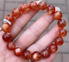 Material:  ...Golden sunstone beads  size :  11mm   quantity: one strand  6mm approx 29 pcs one strands 7mm approx25 pcs one strands 8mm approx 22 pcs one strands 9mm approx 21pcs one strands 10mm approx 19 pcs one strands 11mm approx 18pcs one strands 12mm approx 16 pcs one strands 13mm approx 16 pcs one strands 14mm approx 15 pcs one strands 15mm approx 14pcs one strands 16mm approx 14 pcs one strands 17mm approx 13pcs one strands 18mm approx 13pcs one strands 19mm approx 12pcs one strands 20mm approx 12pcs one strands PLEASE NOTE: 1.Due to lighting effects, monitor's brightness/contrast settings etc, there could be some slight differences in the color tone of the pictures and the actual item. 2.Each piece of natural crystal is unique, the imperfections add natural characters to them. Th Women Bracelet, Beads Bracelet, Bracelet Jewelry, Colour Tone, Natural Crystals, Womens Bracelets, Beaded Bracelet, Gemstone Beads, Jewelry Gifts