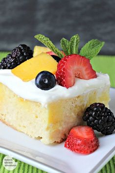 a piece of cake with fruit on top