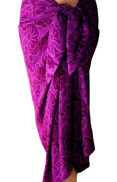 a woman is wearing a purple skirt with an intricate design on the front and side