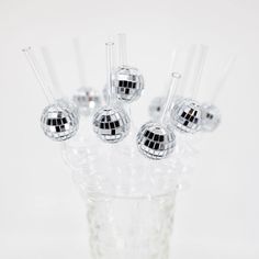 a glass vase filled with lots of clear objects