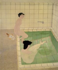 two people in a bathtub with green tiles on the floor and one person laying down