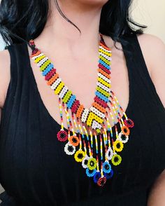 A vibrant and colorful necklace to enhance your style.🏵 Handmade Multicolor Long Bead Necklace, Unique Multicolor Long Beaded Necklace, Colorful Adjustable Beaded Necklaces With Large Beads, Unique Multicolor Beaded Necklaces For Beach, Necklace With Large Round Beads, Colorful Beaded Adjustable Necklaces, Colorful Adjustable Beaded Chain Necklace, Multicolor Large Beads For Festival, Multicolor Beaded Chain For Festival