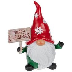 a christmas gnome holding a sign that says merry christmas