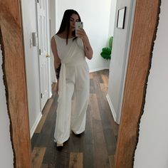 Beautiful Ivory Jumpsuit That I Originally Purchased For Our Wedding Rehearsal But Didn’t Use. New With Tags And Never Been Worn Aside From Trying On. Does Have A Small Black Smudge On The Sheet Part But Isn’t Seen When Worn And A Small, Very Light Stain Near The Neckline That I’m Sure Could Be Removed. Pleating On The Waist Needs To Be Pressed By A Dry Cleaner. Inseams 30.5 Inches Sleeveless Spring Wedding Pantsuit, White Jumpsuits And Rompers For Spring Wedding, Chic White Jumpsuits And Rompers For Wedding Guest, Chic White Jumpsuit For Wedding Guests, Chic White Jumpsuit For Event, Elegant Cream Jumpsuits And Rompers For Party, Elegant Cream Jumpsuit For Party, Fitted Cream Jumpsuit For Workwear, Fitted Cream Jumpsuits And Rompers For Workwear