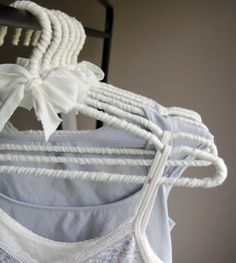 Add a special touch to your closet with these trendy coquette aesthetic hangers.  These are full size hangers constructed using top quality materials.  These hangers are heavy duty, made from stainless steel (no rust) and includes a special groove design that prevents clothing from falling.  The hangers are covered in a soft and slightly off-white color cotton fabric.   Measures: 16.5"W x 7.2"H Sold individually or in a set.  Select at checkout. Aesthetic Hangers, Clothing Hangers, Build A Closet, Clothing Storage, Off White Color, Aesthetic Room Decor, Diy Inspiration, Storage And Organization, Clothes Hanger