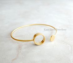 Fashion simple geometry bangle Length, 6.2cm in diameter Adjustable Modern Bangle, Modern Adjustable Round Bangle, Modern Metal Round Cuff Bracelet, Modern Round Metal Cuff Bracelet, Gold Hoop Bangle In Minimalist Style, Minimalist Hoop Bangle As Gift, Minimalist Gold Hoop Bangle, Modern Adjustable Hoop Cuff Bracelet, Metal Hoop Bangle As A Gift