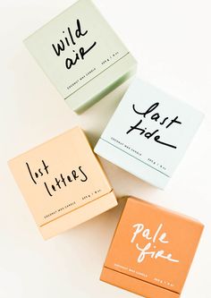 three different types of business cards on a white surface with the words wild art written in black ink