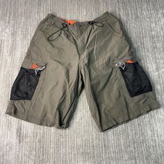 Vintage 2000s Utility Loose Fit Multiple Pocket Basic Essential Streetwear Y2K Aesthetic Green Cargo Shorts 38 Waist Mens Condition:  Excellent Used Condition  = No Flaws Measurements: Please see photos above for all measurements IF YOU BUY TWO OR MORE ITEMS USE THE CODE BUNDLE @ CHECK TO SAVE 20% WE SHIP WITHIN 24 HOURS AFTER PURCHASE! Please be aware that we do not offer free returns!! The Buyer is responsible for the cost of the return label. Follow us on TikTok & Instagram @findsnostalgic and tag us in your finds Casual Green Cheap Cargo Shorts, Functional Streetwear Cargo Shorts, Summer Streetwear Green Cargo Shorts, Casual Multi-pocket Cargo Shorts For Streetwear, Green Cargo Shorts, Green Military Cargo Shorts, Military Cargo Shorts With Multiple Pockets, Green Cargo, Vintage 2000s