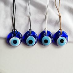 Evil Eye Necklace, Blue Evil Eye Pendant, Nazar Necklace, Glass Evil Eye Jewelry, Protection Necklace, Round Nazar Charm, Evil Eye For Gift Evil eye protection is an ancient belief that helps to protect its owner from jealous eyes. It brings good luck. Also some cultures believe that evil eye necklace brings good health. I hope wearing this jewelry helps your stress, struggles in your daily life <3 All of the glass evil eyes have their own shape, they are handmade and unique like people. It is a Blue Evil Eye Bracelet Gift, Handmade Blue Evil Eye Bracelet, Blue Evil Eye Pendant Necklace, Blue Adjustable Amulet Necklace, Blue Amulet Necklace As Gift, Blue Amulet Necklace For Gift, Nazar Necklace, Blue Evil Eye Necklace, Sliding Knot Closure