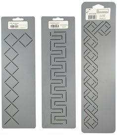 two pieces of gray plastic with designs on the front and back of each piece, one is