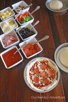 the pizza is prepared and ready to be put into the pans for consumption at the party