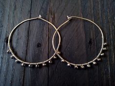 "Beautiful silver plated Swarovski seed crystals in these hoop earrings which i made with 18g. German silver wire or 18g. 925 Silver wire. You can choose from the menu if you want German silver hoops or 925 silver hoops. The polygon shape and the natural flash that is characteristic of crystals can be seen in each dangle. Super light weight. Perfect for the bohemian bride or for bridesmaids gift. Elegant hoop earrings for your bridesmaid girls. German silver called and Alpaka in Greek language, Silver Beaded Hoop Earrings As Gift, Nickel-free Metal Hoop Earrings For Wedding, Silver Metal Hoop Crystal Earrings, Wire Wrapped Small Hoop Sterling Silver Earrings, Hoop Silver Bead Jewelry Gift, Hoop Silver Beads Jewelry Gift, Handmade Silver Crystal Hoop Earrings, Silver Beads Hoop Jewelry For Gift, Hoop Earrings With Silver Beads