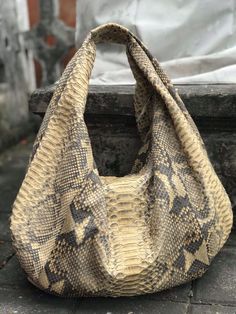 Big Soft Hobo Genuine Python Skin Bag Face: genuine pyhton skin Lining: eco suede Color: cream with motif  Bag measuremets: 50/35/12 cm (19.6/13.7/4.72 inches) Handmade in Bali with lots of love Please note, this is a made to order item any it takes us about 1-2 weeks to ship it, If you need any adjustments please feel free to message me Please note that python skin products is  legal in Indonesia but the buyer is responsible for the custom clearance of his own country. We ship from Bali, if you Python Skin, Soft Bag, Skin Products, Leather Hobo Bag, Hobo Handbags, Leather Hobo, Bag Women, Grocery Bag, Natural Leather