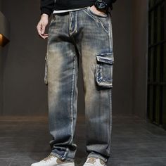 If you have any confusion about what trousers to choose to go with an endless stylish look, find the better solution with these hip-hop trousers. The magnificent stripe design helps distinguish it from other trousers around. It is fashioned to meet the demanding needs of trendy men. These baggy denim trousers will add style to your winter look. Own these trousers at an affordable rate with a click.Specifications Waist Type: MID Thickness: Midweight Style: High Street Place Of Origin: China (Mainland) Origin: Mainland China Material: Denim Length: Full Length Jeans Style: STRAIGHT Item Type: JEANS Gender: MEN Fit Type: STRAIGHT Fabric Type: Stripe Closure Type: Zipper Fly CN: Jiangsu Brand Name: GeraldBlack Applicable Season: Autumn And Winter Applicable Scene: Casual When purchasing clothi Hip Hop Straight Leg Relaxed Fit Cargo Jeans, Hip Hop Cargo Jeans With Relaxed Fit, Hip Hop Streetwear Jeans Full Length, Hip Hop Streetwear Full Length Jeans, Hip Hop Straight Leg Pants With Pockets, Hip Hop Streetwear Pants With Straight Leg, Hip Hop Straight Leg Jeans With Side Pockets, Hip Hop Style Straight Leg Jeans With Side Pockets, Hip Hop Style Cargo Jeans