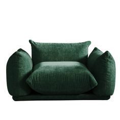 a green chair with two pillows on it