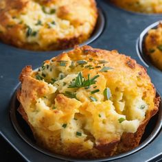 several muffins with cheese and herbs in the middle