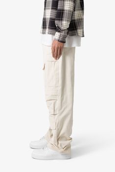 the Ultra Baggy Cargo Pants are designed with a new oversized ultra baggy fit, constructed from a ripstop fabric with a rinse wash, featuring cargo pockets throughout with snap closures, and finished with a button placket. details ultra baggy fit throughout 100% cotton extended inseam model is 6’1, 140 lbs and wears a size 30 140 Lbs, Baggy Cargo Pants, Ripstop Fabric, Baggy Fits, Button Placket, Cargo Pants, Off White, Pants, Fabric