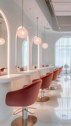 the salon is clean and ready for customers to take their own seats in it's sleek, modern design