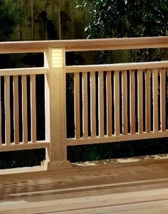 a wooden bench sitting on top of a wooden deck