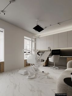 a room with white walls and marble flooring