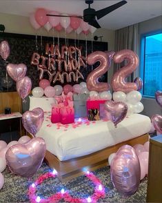 a birthday party with balloons and decorations