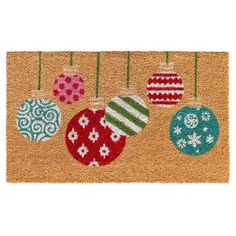 a door mat with ornaments hanging from it