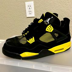 Air Jordan 4 (IV) Thunder 2006 Retro Black / Tour Yellow Jordan 4 Black And Yellow, Black And Yellow 4s, Black And Yellow Jordans, Yellow Thunder 4s, Outfits With Jordan 4s, Tenis Jordan Retro, Jordan 4s Black, Yellow Jordans, Jordan 4 Yellow Thunder