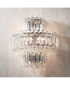 a crystal chandelier hanging on the wall