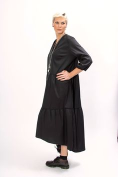 The Black Oversized shirt dress is our favorite weekender. this Plus size maxi dress featuring an oversized relaxed fit, two side pockets and 7/8 sleeves. The Black cotton tunic dress is made from cotton, that is versatile for any occasion! This plus size clothing is designed to be comfortable and not troublesome to wear. After wearing this Black long sleeve shirt dress, you will love it even more. This Oversized shirt dress is designed to flatter every body type and fit numerous occasions. When Flowy Cotton Maxi Dress For Fall, Oversized Maxi Dress For Daywear, Casual Loose Fit Maxi Dress For Fall, Relaxed Fit Maxi Dress With Pockets For Daywear, Casual Oversized Maxi Dress For Fall, Oversized V-neck Maxi Dress For Fall, Modest Maxi Dress With Pockets, Relaxed Fit Cotton Maxi Dress For Fall, Modest Maxi Dress With Relaxed Fit