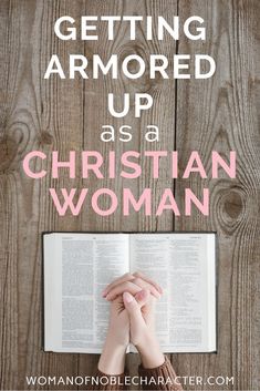 hands holding an open book with the words getting armored up as a christian woman