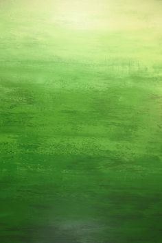 an abstract painting with green and yellow colors